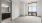 carpeted bedroom with private bathroom