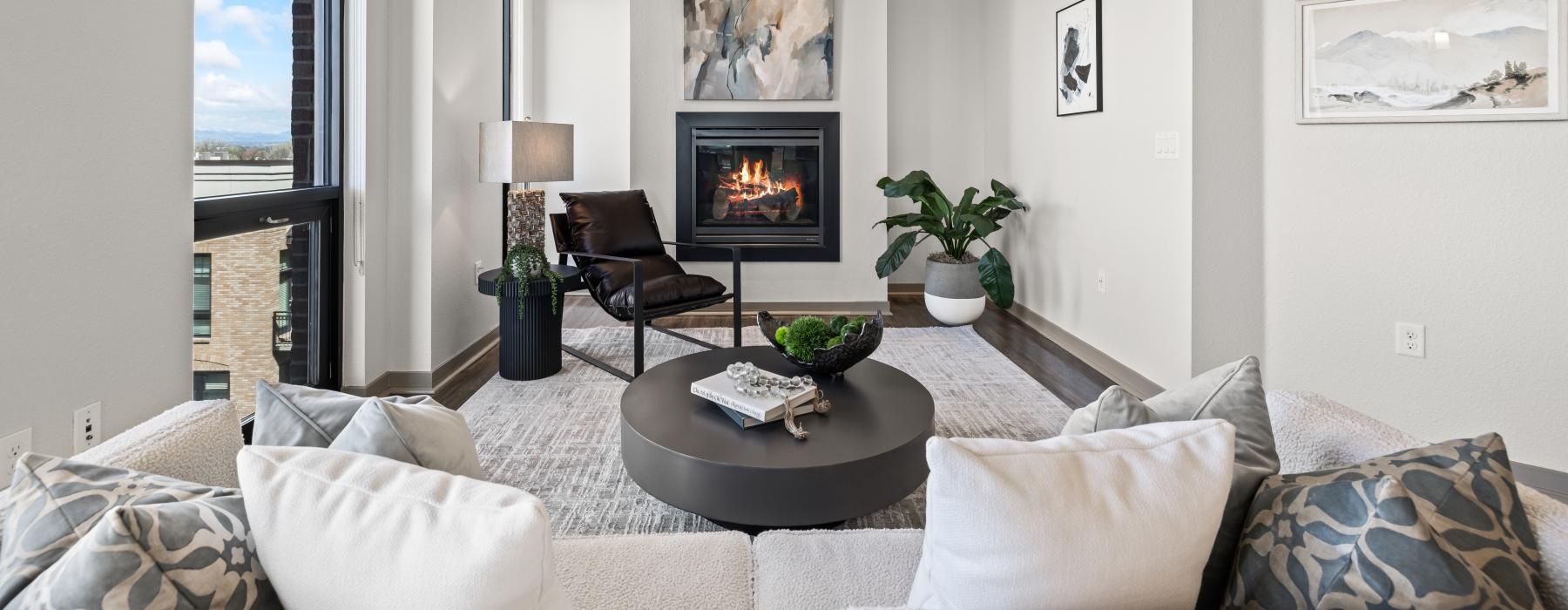 a living room with a fireplace