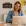a woman working at a laptop