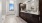 a bathroom with walk-in shower and separate tub