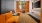 viewing room with couches and large tv