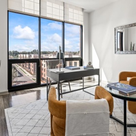 Spacious and well-lit living spaces large picture windows brightens living room